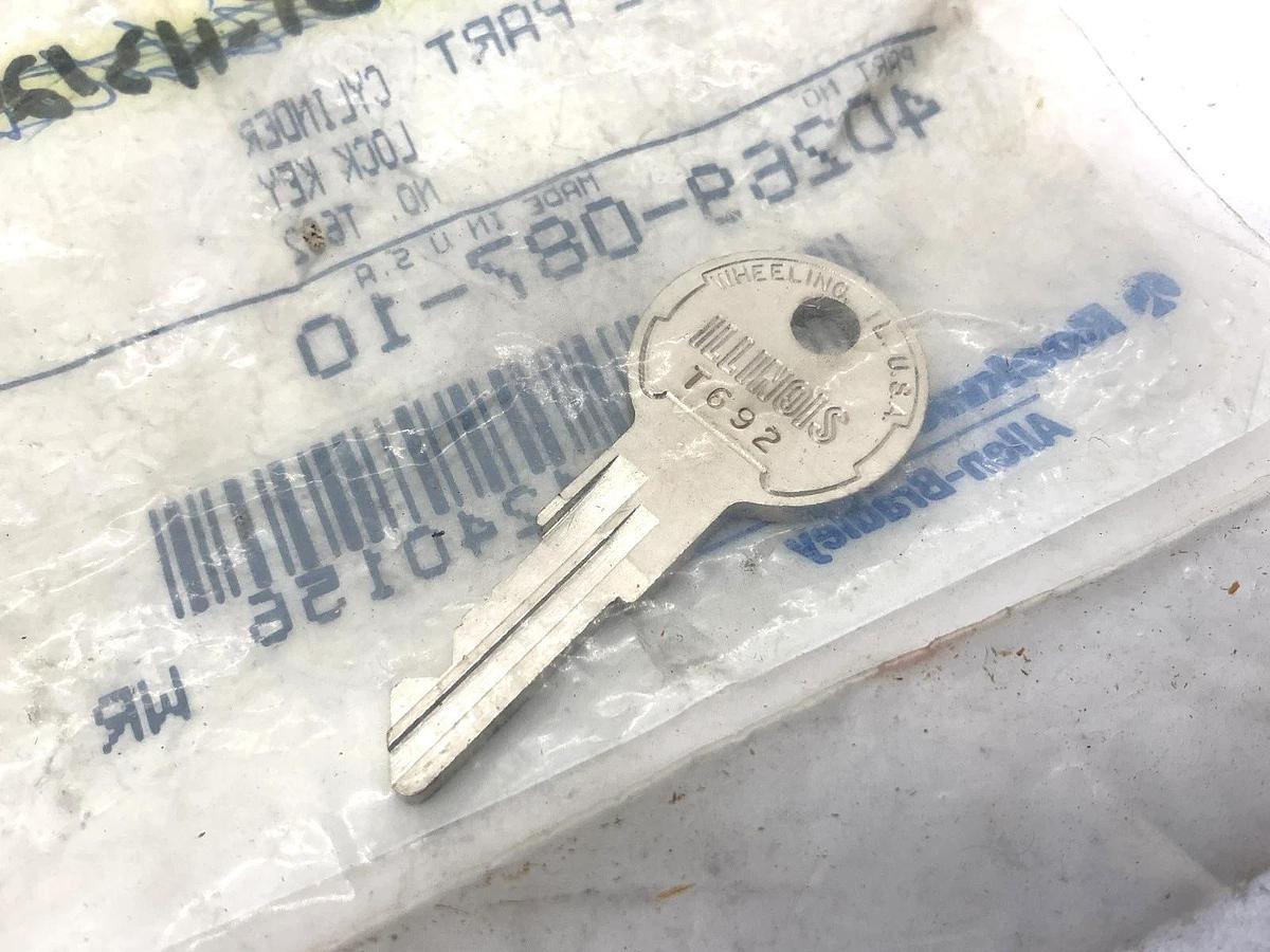 New Allen Bradley 40269-087-10 Renewal Part Cylinder Lock Key No. T692