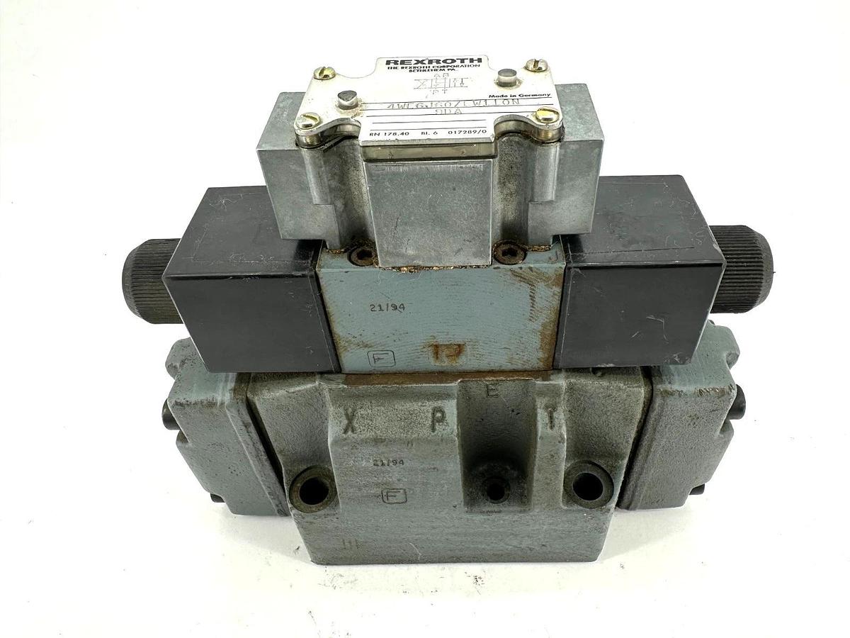 Used Rexroth 4WE6J60/EW110N 9DA Hydraulic Directional Valve 120V
