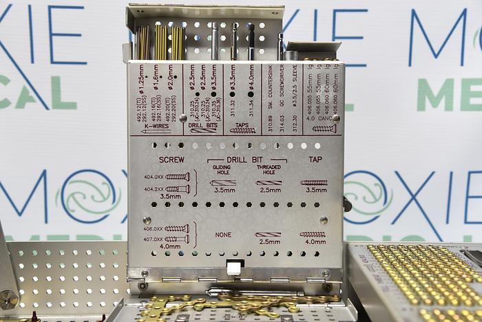 Used Synthes Small Fragment Instrument and Titanium Implant Set – LC –DCP, with Self-Tapping Screws 145.448