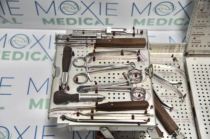 Used Synthes Mini Fragment Instrument and Titanium Implant Set, With Self-Tapping Screws 145.488