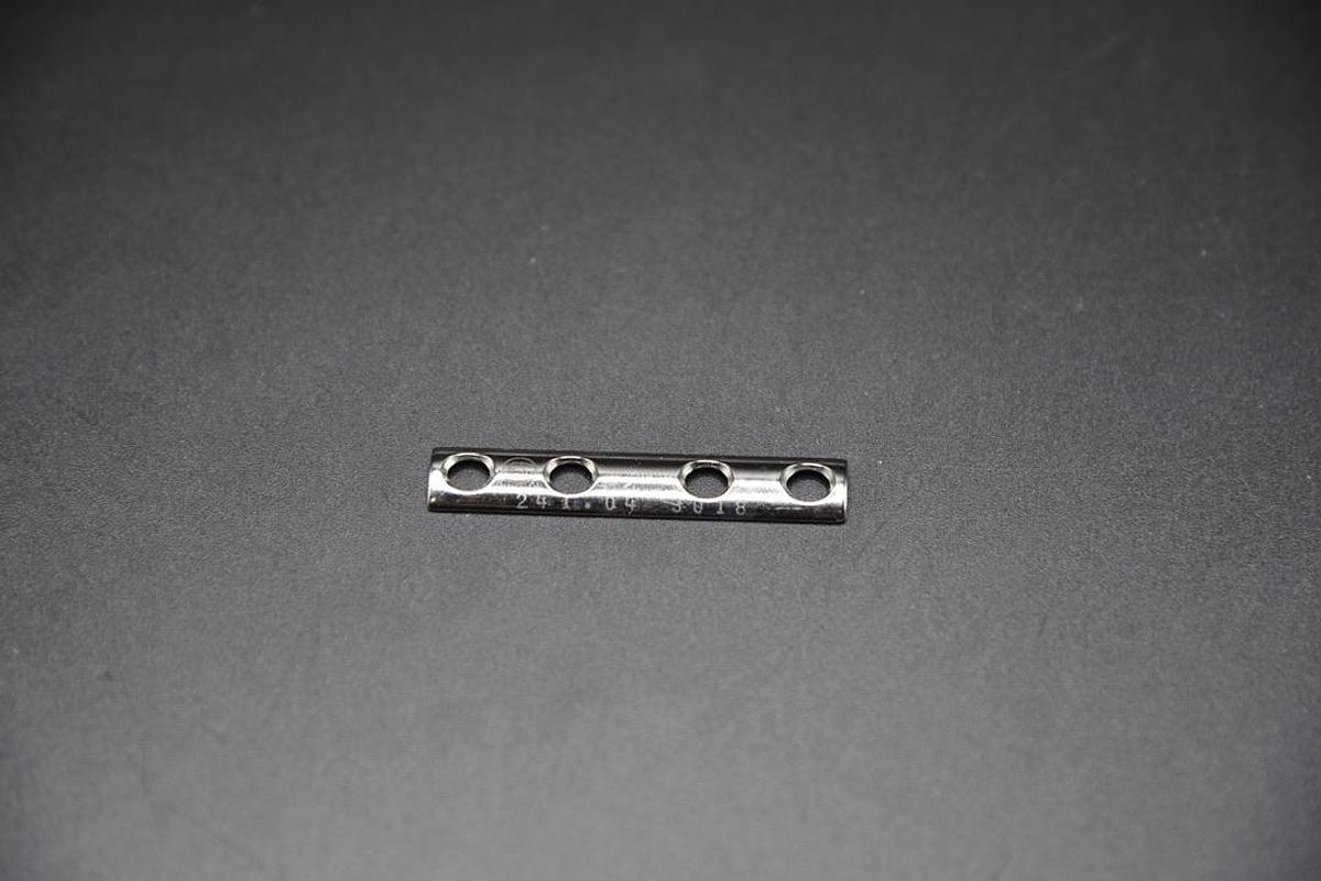 Used SYNTHES 241.04 STAINLESS STEEL TUBULAR PLATE, 1/3 SIZE, 49MM LENGTH, 4 HOLES