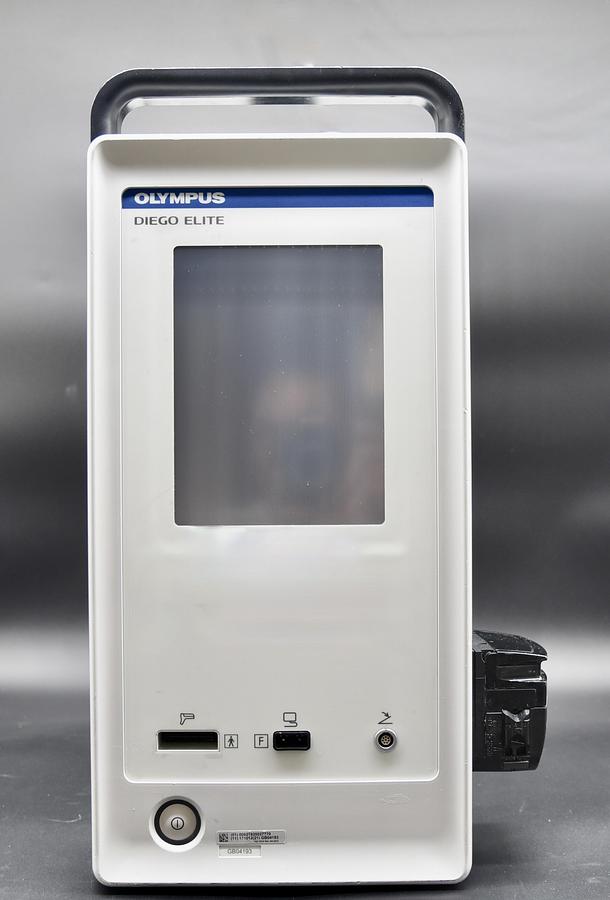 Used OLYMPUS DIEGO ELITE MULTIDEBRIDER SYSTEM POWER CONSOLE MDCONS100, ANGLED HANDPIECE MDHP100A AND OLYMPUS MDFS100 FOOTSWITCH