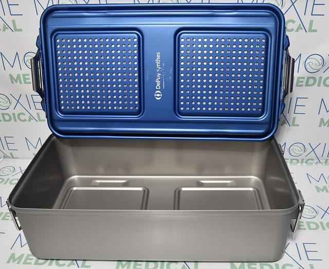 Used DEPUY SYNTHES 62.016.003 STERILIZATION CONTAINER FULL-THREE LEVEL SOLID BASE 