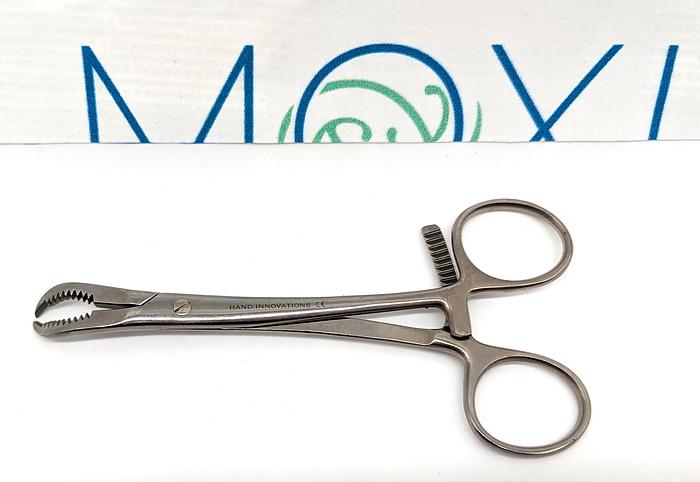 Used Hand Innovations Bone Clamp