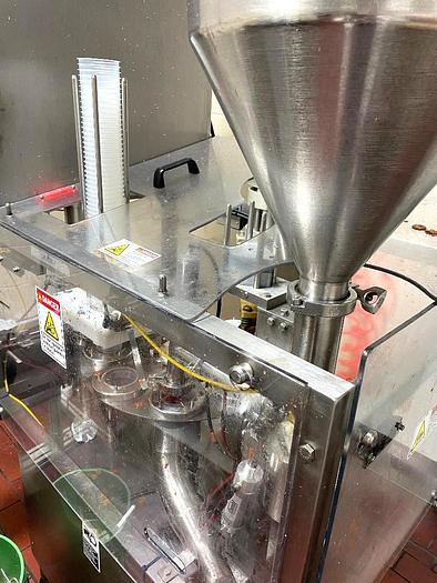 Used Modern Packaging Model SR-8DC 8 Head Rotary Cup Filler Sealer