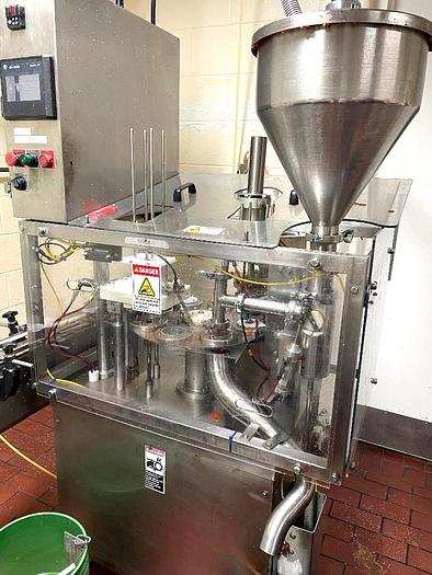 Used Modern Packaging Model SR-8DC 8 Head Rotary Cup Filler Sealer