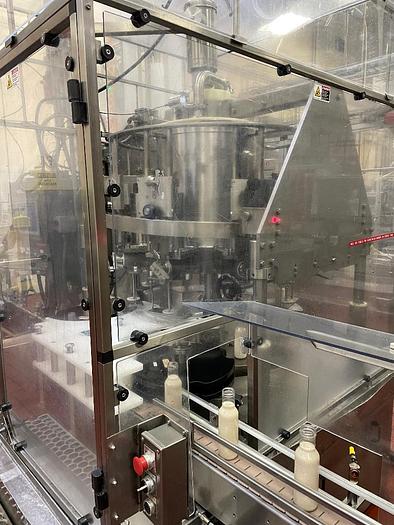 Used Cozzoli Model RFP-8 8 Head Rotary Filler with McBrady Model 200 Bottle Cleaner