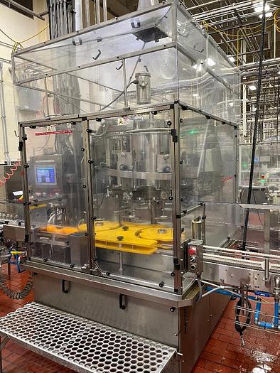 Used Cozzoli Model RFP-8 8 Head Rotary Filler with McBrady Model 200 Bottle Cleaner