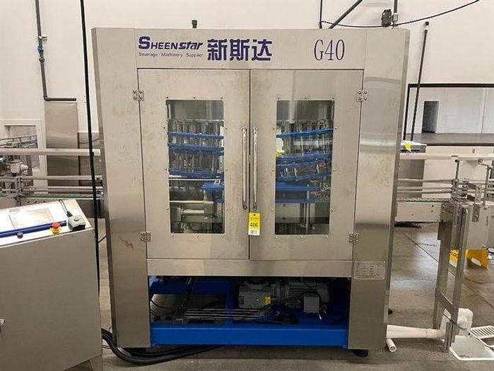 Used Sheenstar Model G40 Gravity Filler Machine