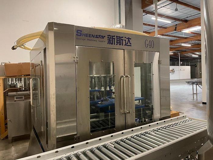 Used Sheenstar Model G40 Gravity Filler Machine