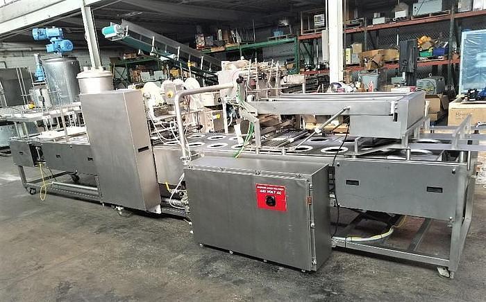 Used PMR Model 1300 Dual Lane Continuous Container Filler Sealer Lidder Stainless Steel Sanitary