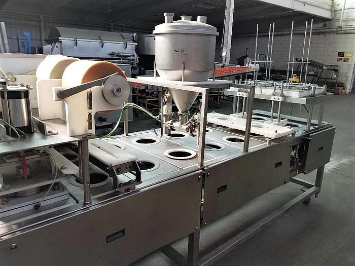 Used PMR Model 1300 Dual Lane Continuous Container Filler Sealer Lidder Stainless Steel Sanitary