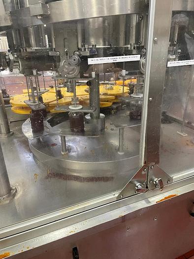 Used Cozzoli Model RFP-8 8 Head Rotary Filler with McBrady Model 200 Bottle Cleaner