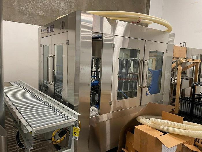 Used Sheenstar Model G40 Gravity Filler Machine