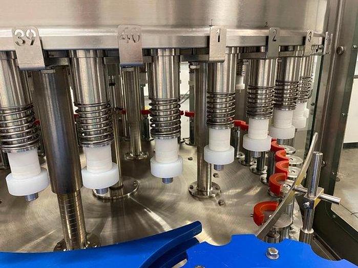 Used Sheenstar Model G40 Gravity Filler Machine