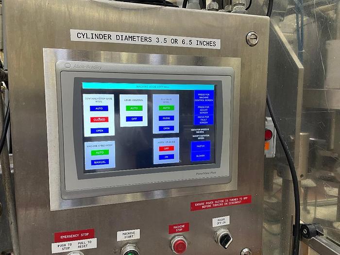 Used Cozzoli Model RFP-8 8 Head Rotary Filler with McBrady Model 200 Bottle Cleaner