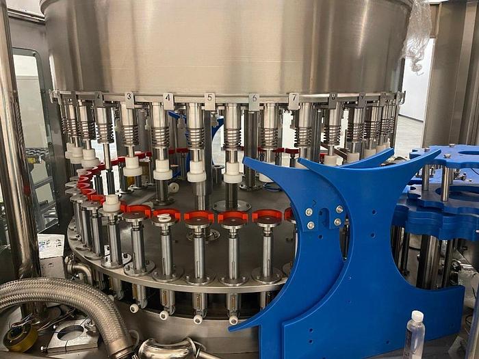 Used Sheenstar Model G40 Gravity Filler Machine