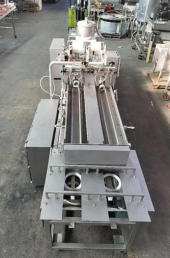 Used PMR Model 1300 Dual Lane Continuous Container Filler Sealer Lidder Stainless Steel Sanitary