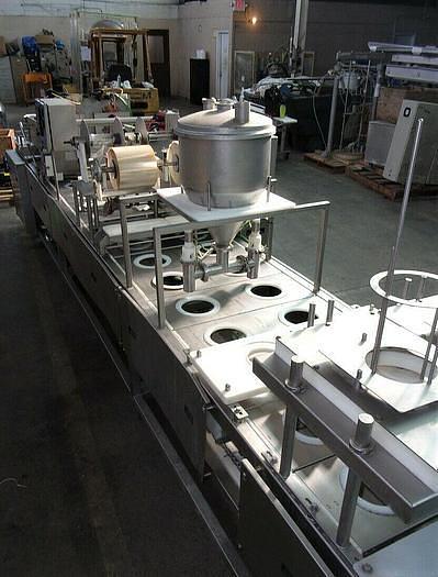 Used PMR Model 1300 Dual Lane Continuous Container Filler Sealer Lidder Stainless Steel Sanitary