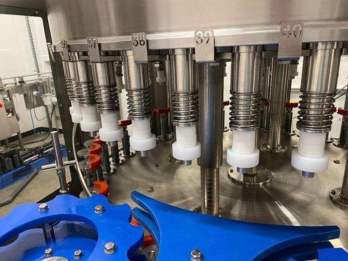 Used Sheenstar Model G40 Gravity Filler Machine