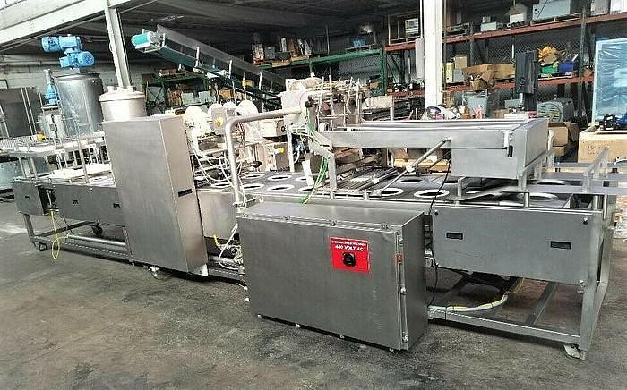 Used PMR Model 1300 Dual Lane Continuous Container Filler Sealer Lidder Stainless Steel Sanitary
