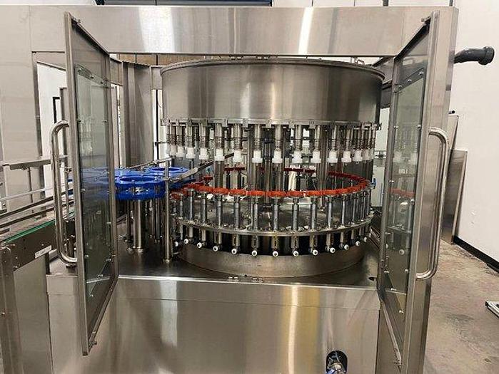 Used Sheenstar Model G40 Gravity Filler Machine