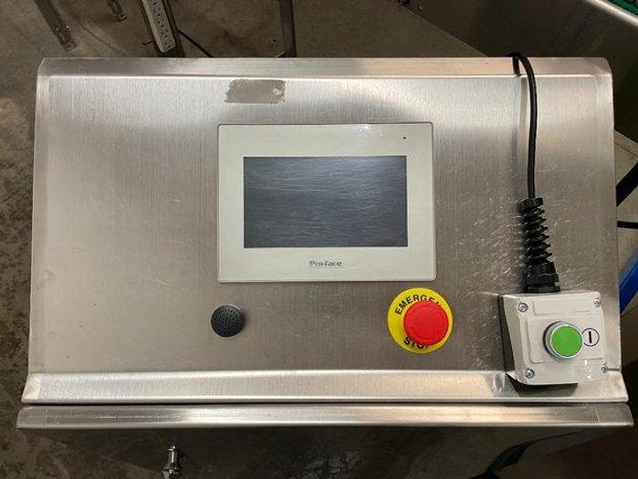 Used Sheenstar Model G40 Gravity Filler Machine