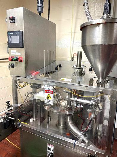 Used Modern Packaging Model SR-8DC 8 Head Rotary Cup Filler Sealer