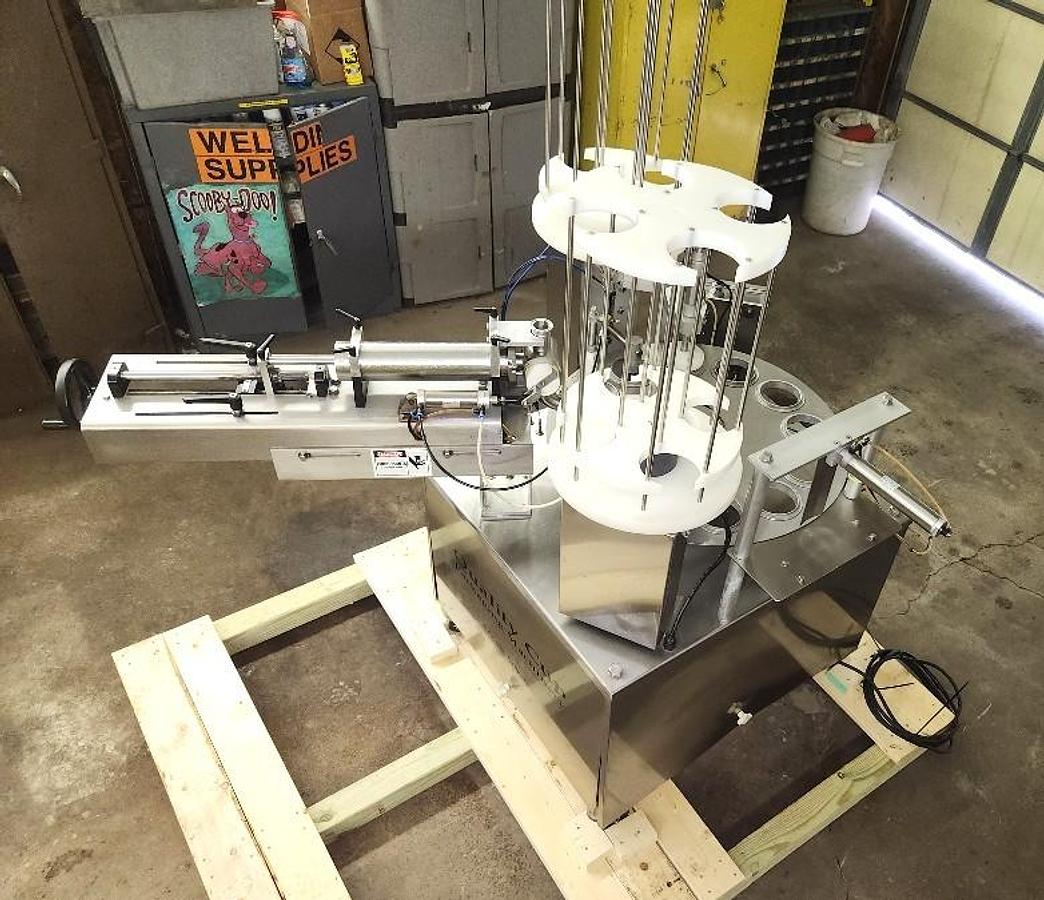 Used Quality Cup Model QC-32 12 Station Stainless Steel Sanitary Rotary Cup Filler