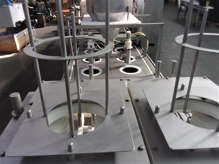 Used PMR Model 1300 Dual Lane Continuous Container Filler Sealer Lidder Stainless Steel Sanitary