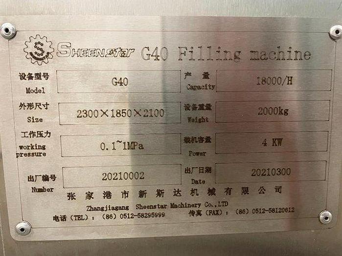 Used Sheenstar Model G40 Gravity Filler Machine
