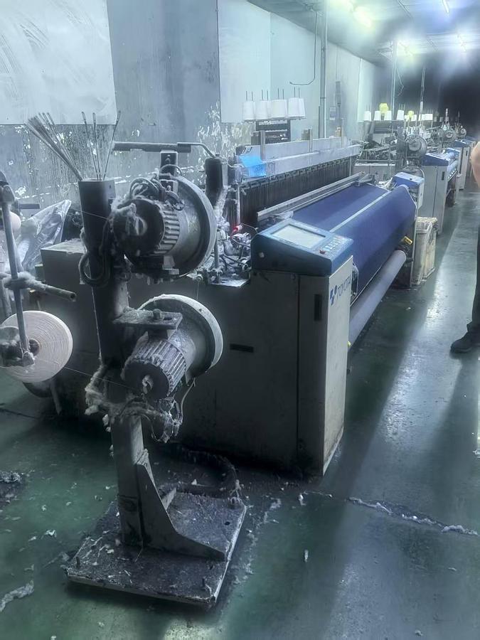 Used Toyota T710 air jet loom for fabric