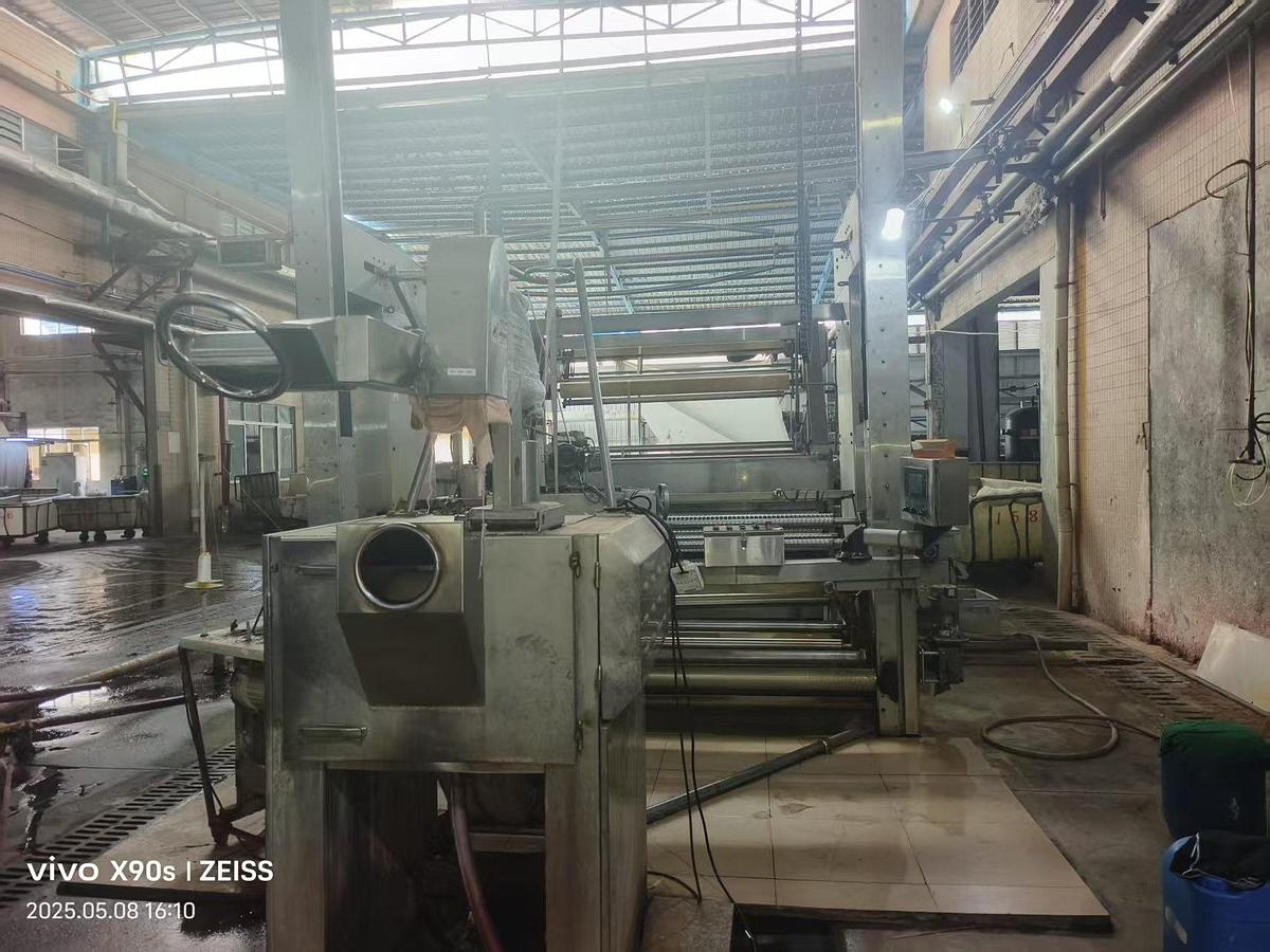 Used Hsing Cheng slitting machine for fabric