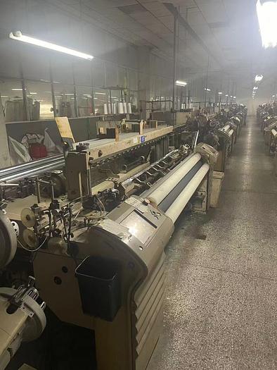 Used Tsudakoma ZAX 9100 air jet loom for fabric