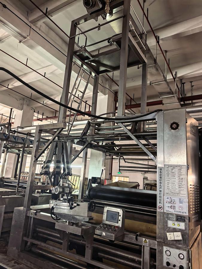 Used KELUN slitter with washing machine for fabric
