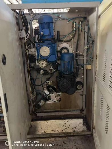 Used Ferraro tubular Comptex machine for fabric