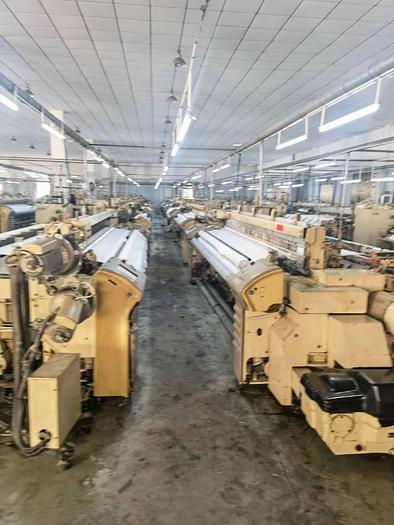 Used Tsudakama ZAX9100 air jet loom for fabric