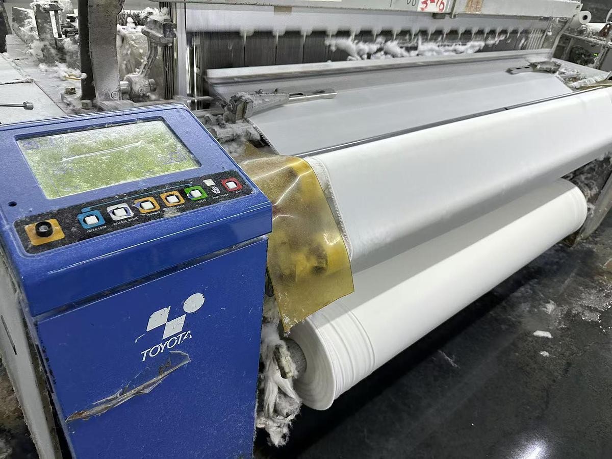 Used Toyota T610 air jet loom for fabric