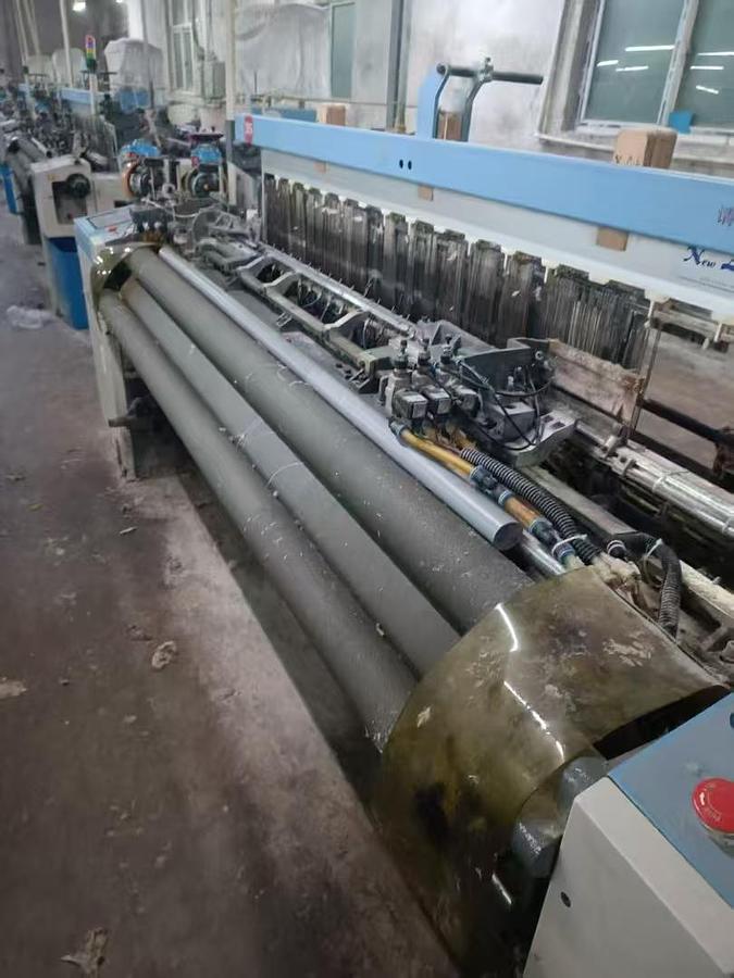 Used Rifa Airjet loom for fabric