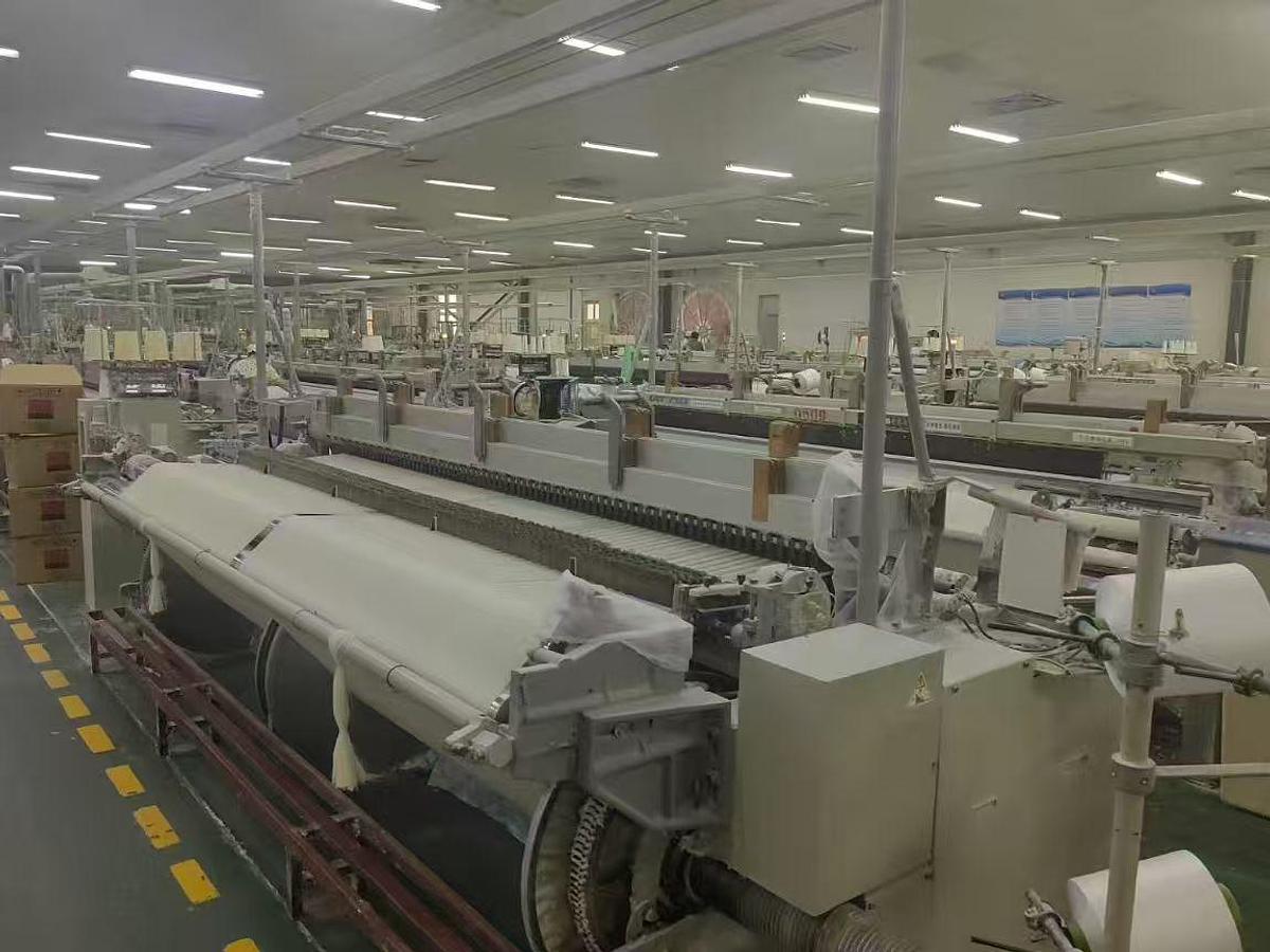 Used Toyota T710 air jet loom for fabric