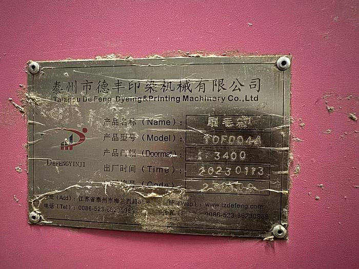 Used De Feng singeing machine for fabric