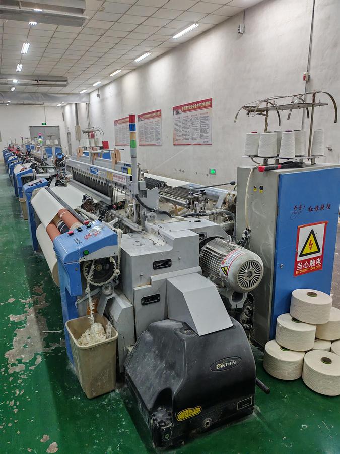 Used 16 sets Red flag air jet loom for fabric