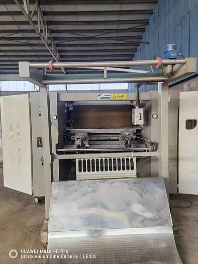 Used Ferraro tubular Comptex machine for fabric