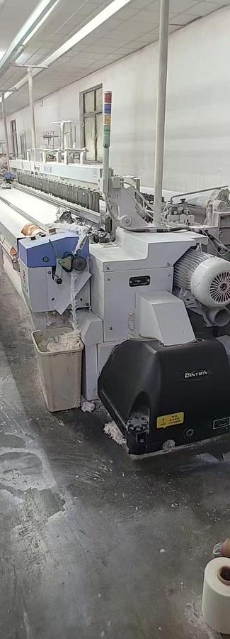 Used red flag air jet loom for fabric