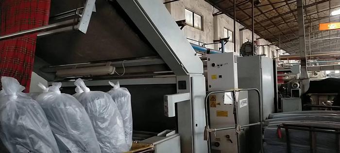 Used Ferraro open width compactor for fabric