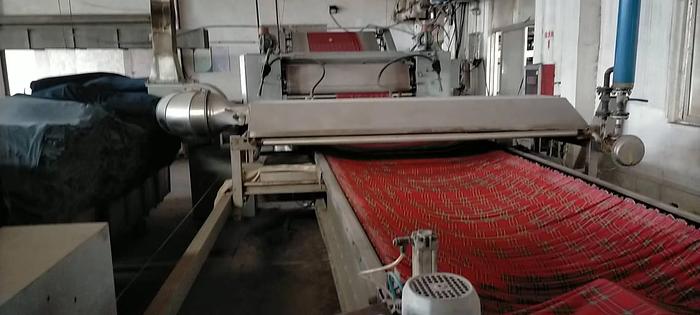 Used Ferraro open width compactor for fabric