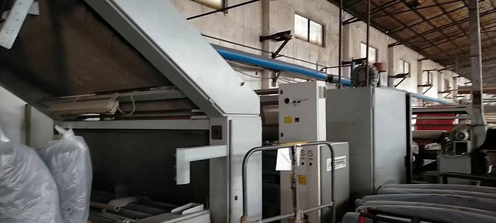 Used Ferraro open width compactor for fabric