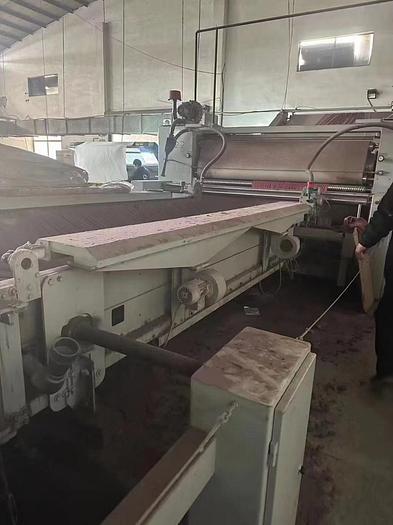 Used Ferraro open width compactor for fabric