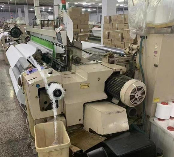 Used 2003 24 sets Tsudakama ZAX-E air jet loom for fabric