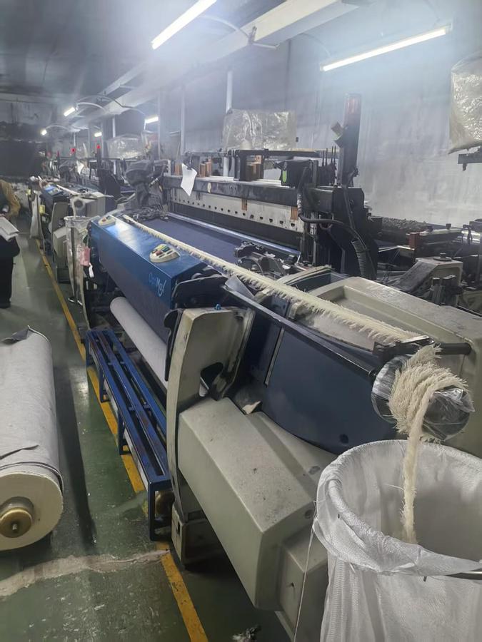Used Picanol OptiMax rapier loom for fabric
